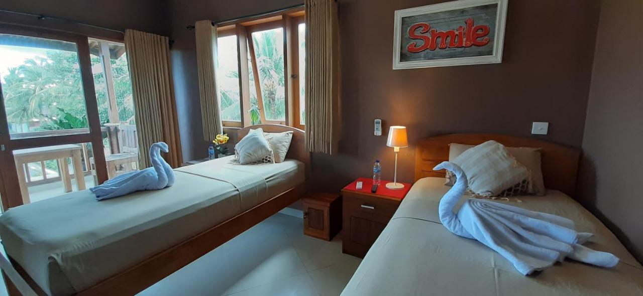 Hotel The Point Surfcamp Bali à Pulukan Extérieur photo
