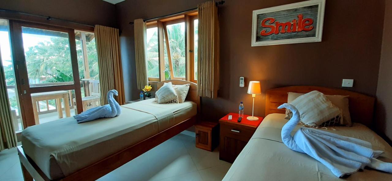 Hotel The Point Surfcamp Bali à Pulukan Extérieur photo