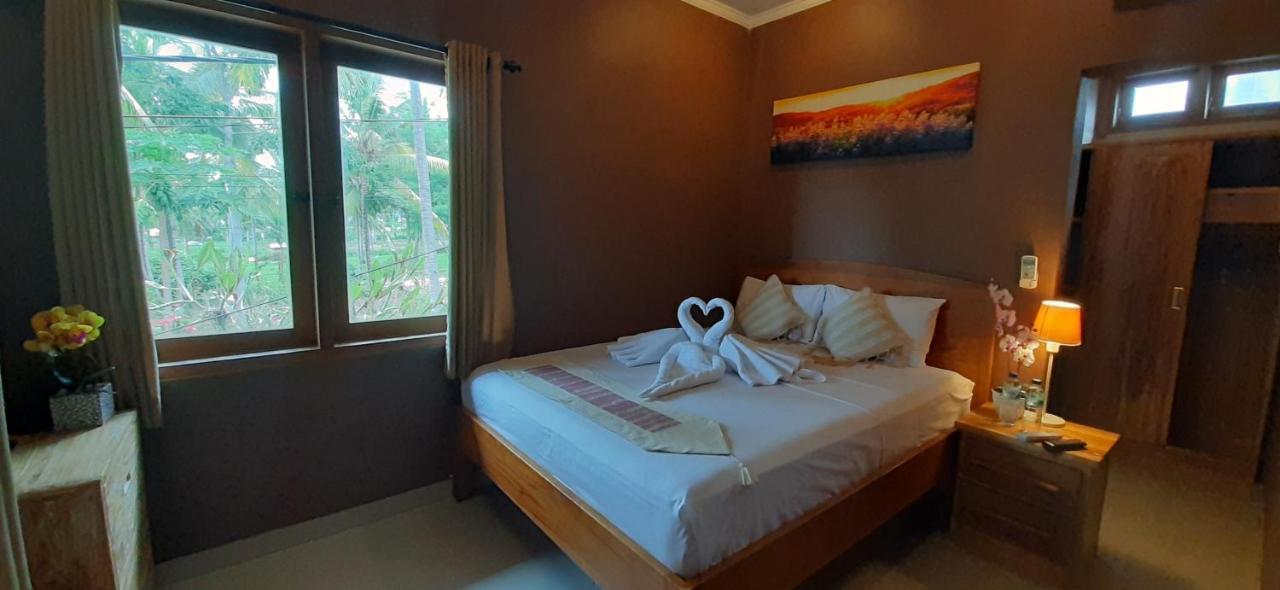 Hotel The Point Surfcamp Bali à Pulukan Extérieur photo